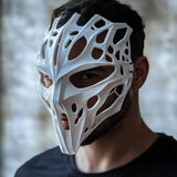 3D printed biomorphic cyberpunk mask with organic skeletal openings and futuristic facial geometry.