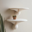 Set of two matte white 3D printed wall shelves inspired by honey mushrooms.