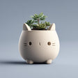 Cute 3D printed matte PLA cat-shaped planter with a rounded body and tiny feet.