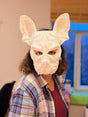3D printed French bulldog mask with upright ears and geometric dog-face contours.