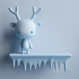 3D printed wall shelf with a smooth icicle-edge ledge and a small antlered character standing on top.