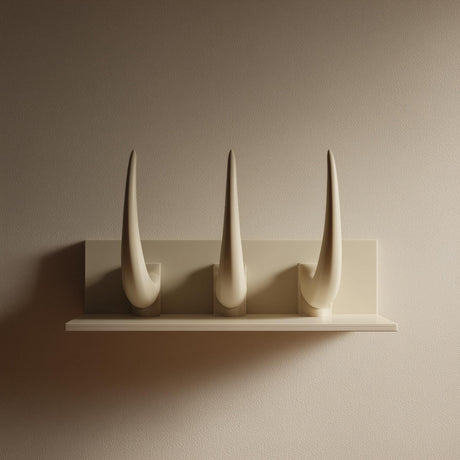 3D printed wall-mounted shelf with three tall curved horns rising from a back panel in matte PLA.