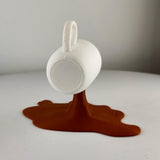 Additional product presentation of Spilled Espresso Sculpture.