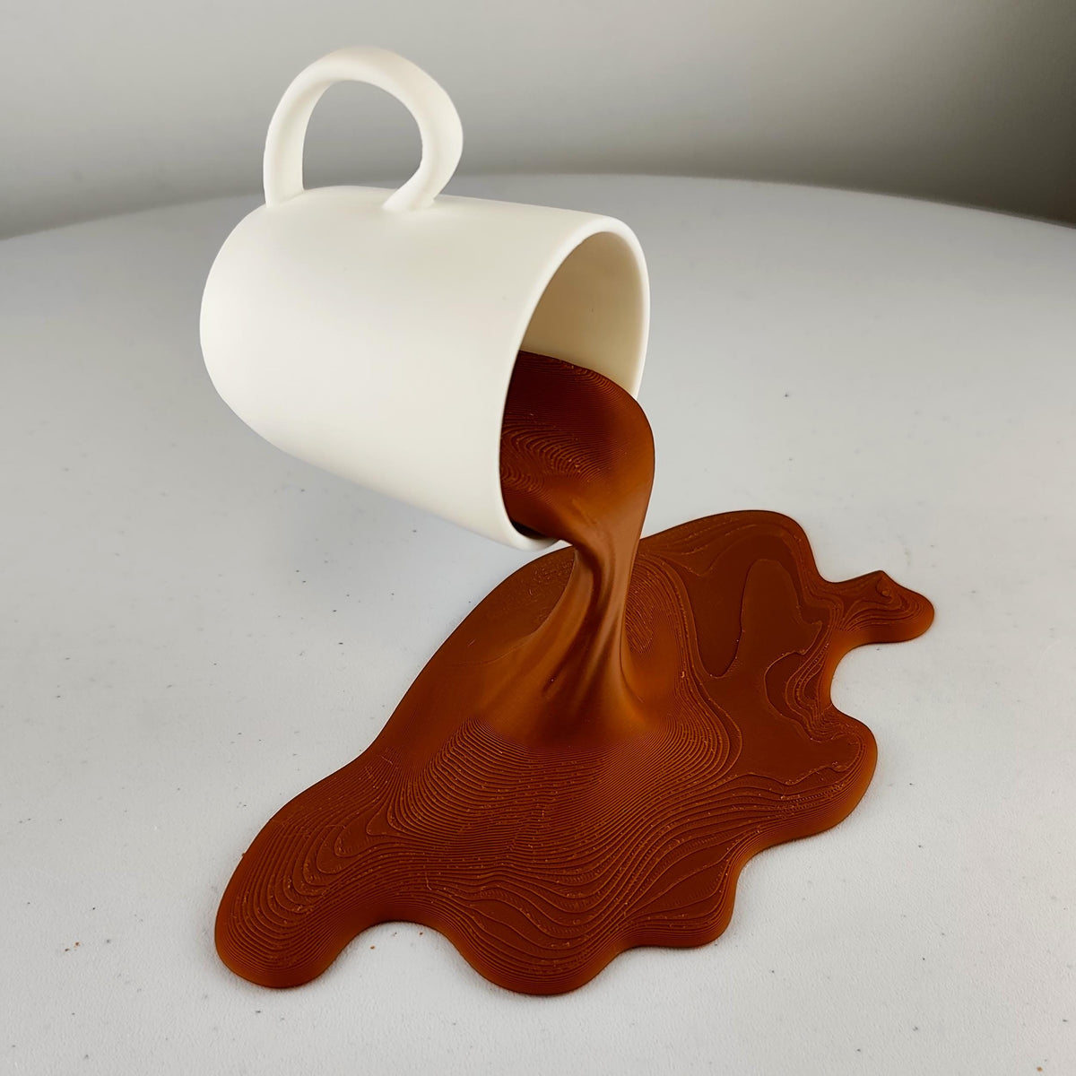 Product gallery view of Spilled Espresso Sculpture.