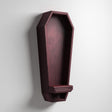 3D printed vertical coffin-shaped wall shelf in dark matte PLA with a small ledge at the bottom.