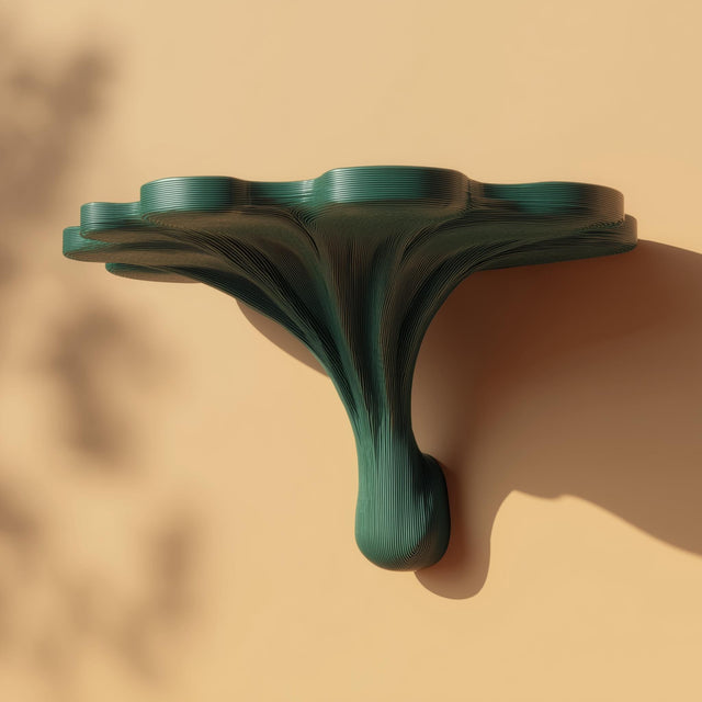 3D printed fantasy mushroom wall shelf with an organic stem base and wide cap-shaped floating ledge.