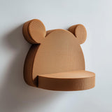 3D printed cute bear-shaped wall shelf with rounded ears and a small circular floating ledge.