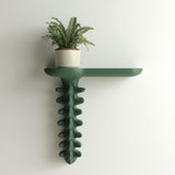 3D printed wall-mounted shelf with an organic sculptural support resembling natural growth.