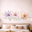 A horizontal watercolor illustration of three lilies in a row on a white background.