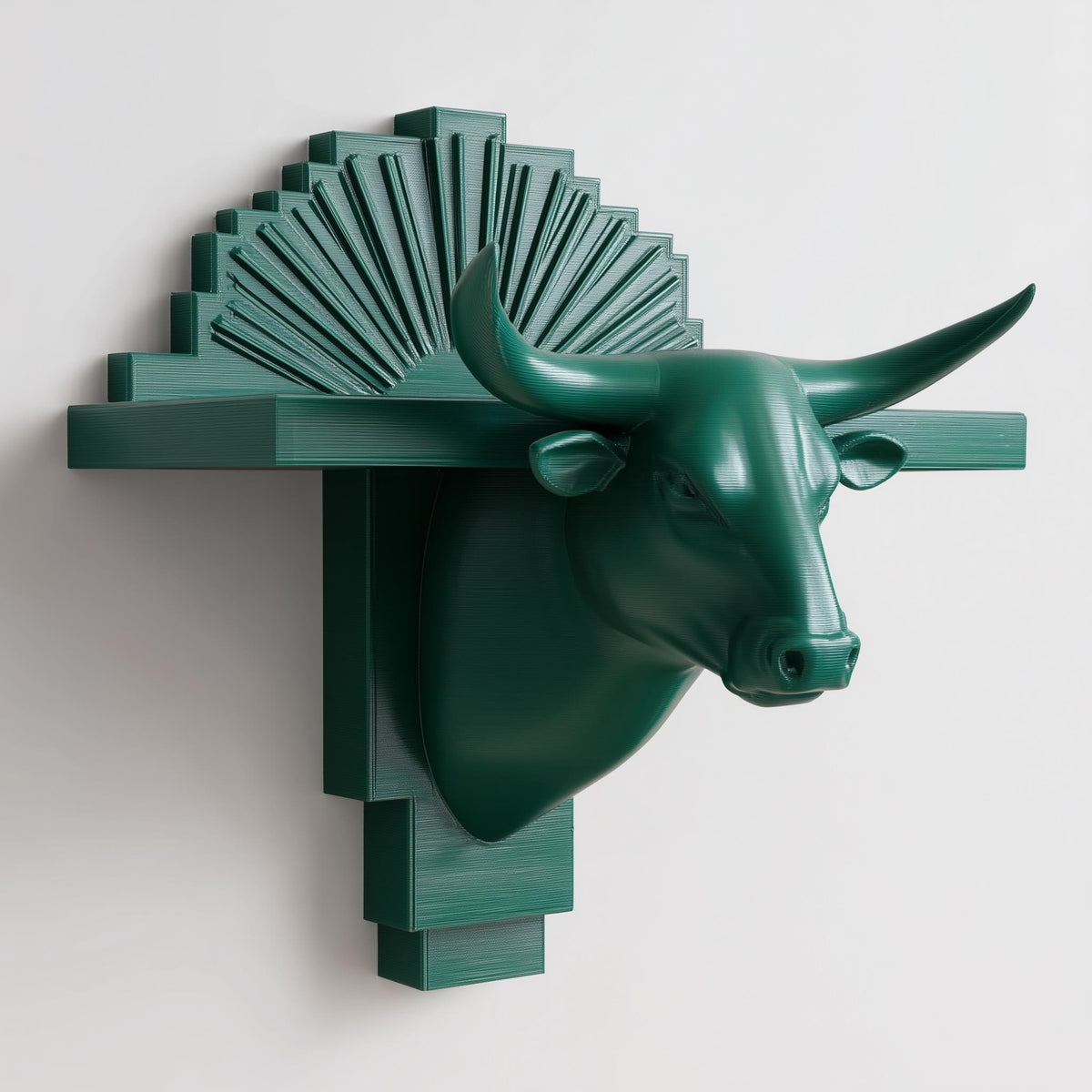 3D printed bull head wall shelf with long horns and an art deco fan-shaped backplate.