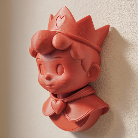 3D printed wall-mounted cute anime prince figure with a crown and heart-shaped cape detail.