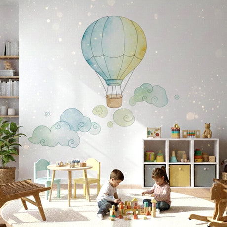 Watercolor wall decal of a single hot air balloon in light blue and pale yellow floating against a clean background.