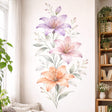 A vertical watercolor illustration of a floral arrangement featuring three large lilies on a white background.