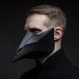 3D printed dark techno raven beak mask worn on an adult model.
