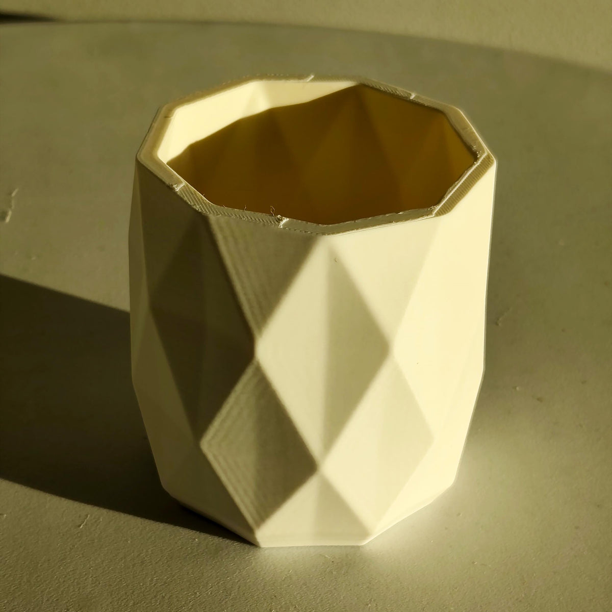 3D Printed Faceted Brush and Pen Holder shown in the product image.