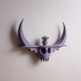 Horned fantasy figure wall shelf displayed from another angle.