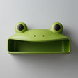 3D printed frog character wall shelf with round eyes and open storage cubby