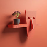 3D printed tentacled character face wall shelf with integrated display ledge