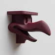 3D printed beaked creature wall shelf with elongated fantasy face and integrated ledge