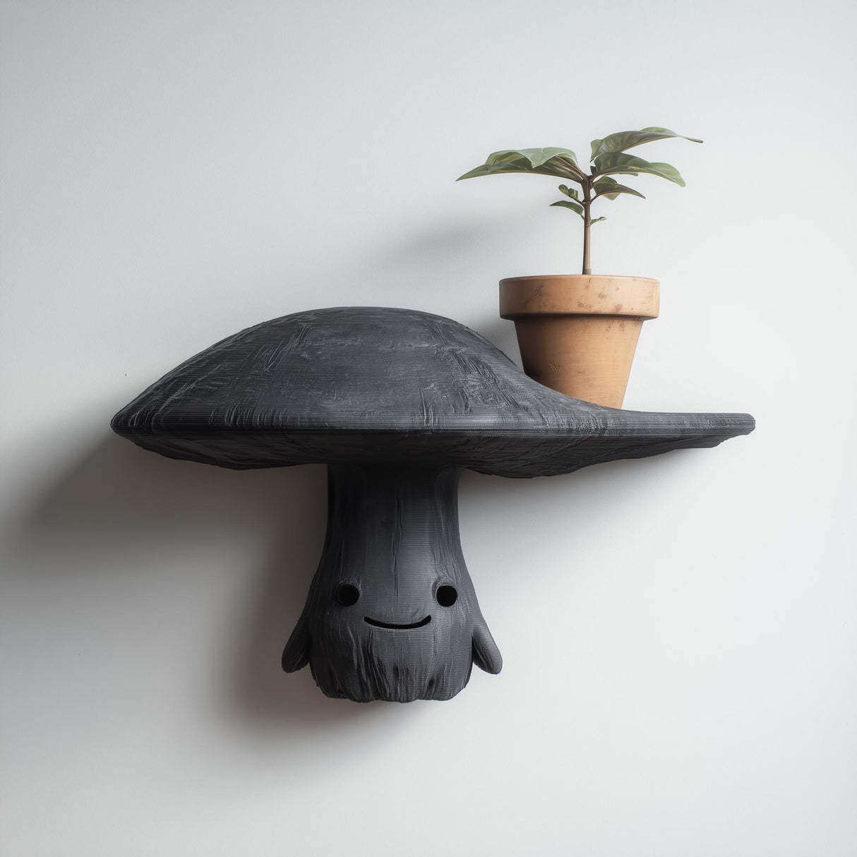 3D printed mushroom character wall shelf with smiling face and broad cap display ledge