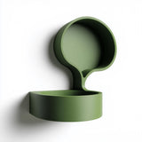 3D printed wall mounted organic bubble shelf with a rounded circular backplate and a small floating ledge tray.