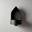 3D printed arched wall mounted shelf with a pointed backplate and a small integrated bowl tray.