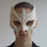3D printed horned futuristic cosplay mask with sweeping crest forms and open eye cutouts