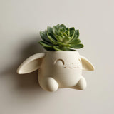 3D printed fantasy bunny wall planter with wide ears, paws and integrated cavity