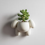 3D printed puppy wall planter with floppy ears and integrated top plant cavity