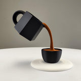 Additional product view of Floating Coffee Pour Sculpture.