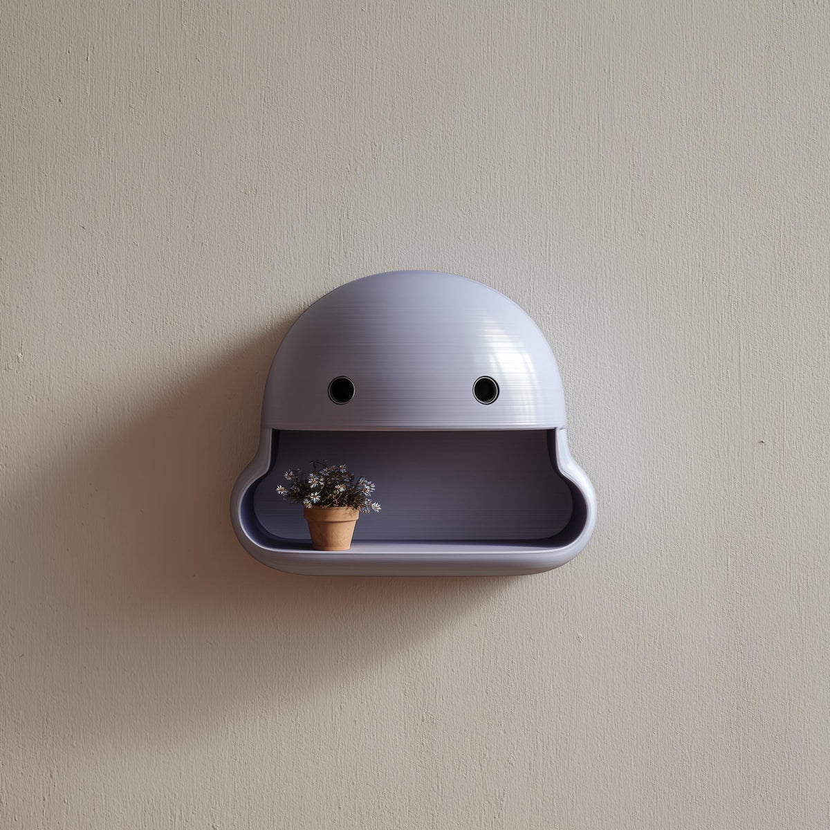 3D printed kawaii face wall shelf with round eye cutouts and open-mouth display niche
