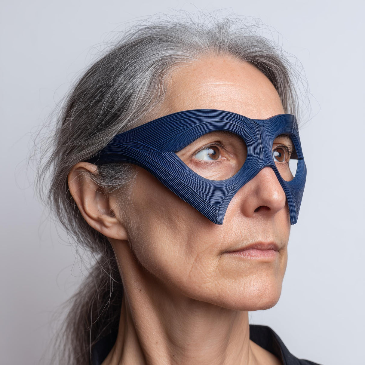 3D printed avant-garde mask glasses style eye mask with large oval eye cutouts and angular side panels.