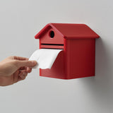 3D printed mailbox-style wall toilet paper holder with pitched roof and front opening