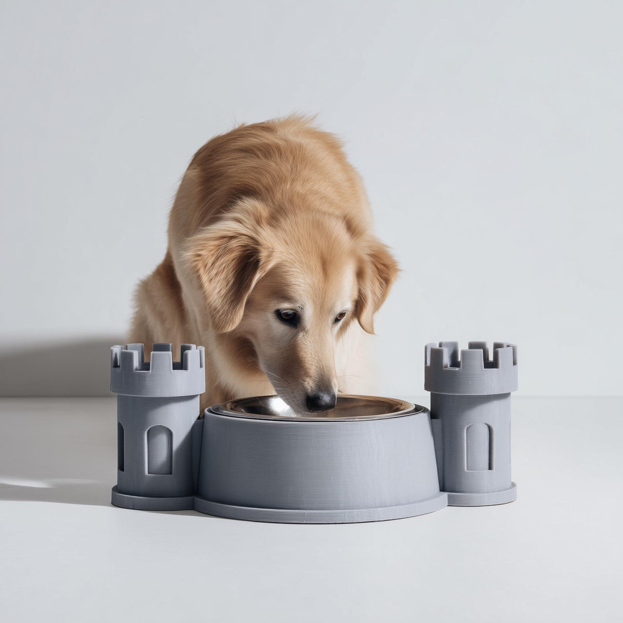 3D printed castle turret pet bowl holder stand with two tower sides and a central bowl opening.
