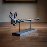 Product gallery view of 3D Printed Rabbit Skull Magic Wand with Stand.