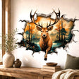 3D broken wall vinyl decal showing a stag with large antlers stepping out of a forest landscape with warm autumn colors.