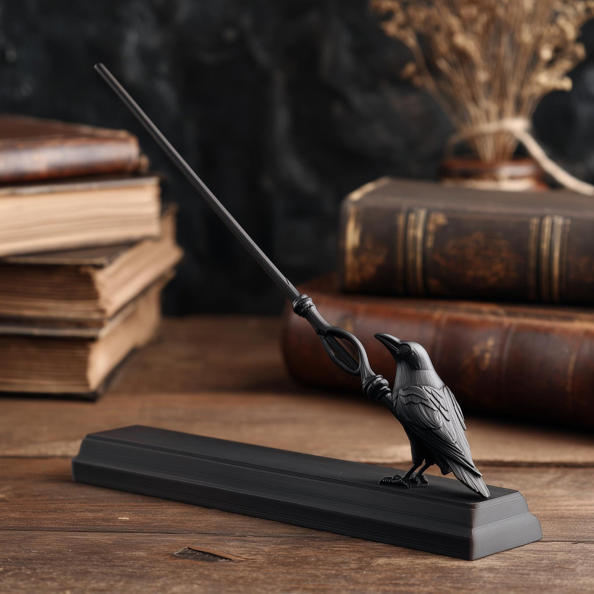 3D printed raven magic wand with sculpted bird detail and matching display stand