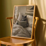 Product detail view of Russian Blue Cat Reading in Bed Poster.