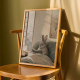 Product detail view of Californian Rabbit Reading in Bed Poster.