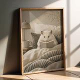 Product presentation view of Winter White Hamster Reading in Bed Poster.
