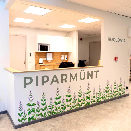 Watercolor-style wall vinyl decal of a peppermint (piparmünt) herb border.