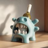 3D printed open-mouth creature wine bottle holder supporting a standard bottle