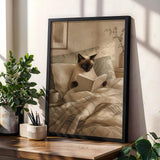 Product gallery view of Siamese Cat Reading in Bed Poster.