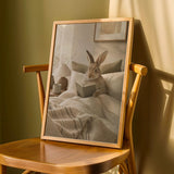 Product detail view of Californian Rabbit Reading in Bed Poster.