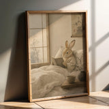 Product presentation view of Tan Rabbit Reading in Bed Poster.