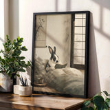Product gallery view of Harlequin Rabbit Reading in Bed Poster.