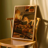 Product detail view of Golden Syrian Hamster Reading in Armchair Poster.