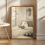 Product view of White Guinea Pig Reading in Bed Poster.