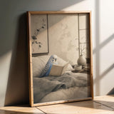 Product presentation view of Pastel Blue Budgerigar Reading in Bed Poster.