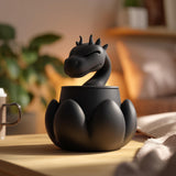 3D printed fantasy dragon memorial urn with removable lid and sculpted dragon emerging from the top.